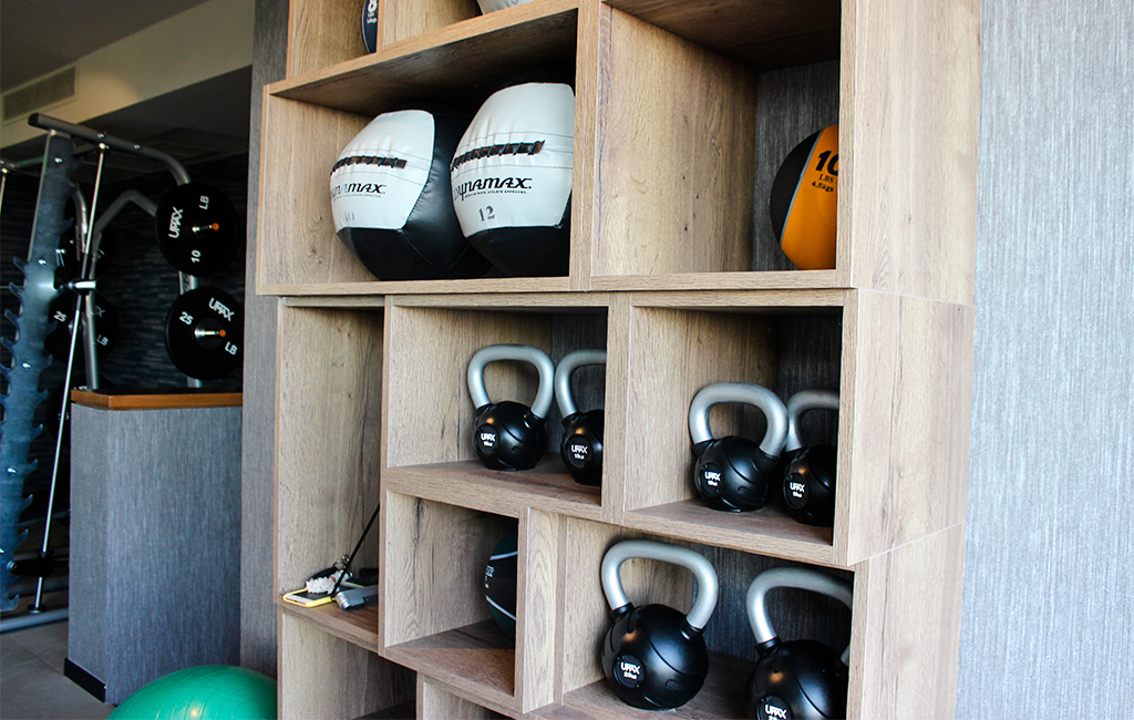 Home Gym design Wall Shelving and Kettle Bells and Balls